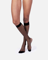 The Untame by Hedoine biodegradable black fishnet knee-high socks for women